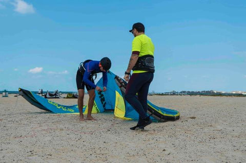 Private kitesurfing lesson in action on Dubai beach with IKO instructor