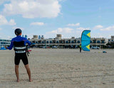 IKO certified instructor demonstrating safety systems for kitesurfing