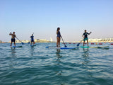 Family Stand Up Paddling on the sea